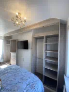 Navara ash wardrobe built to accommodate a chimney breast and sloped cielings, installed in Redcar